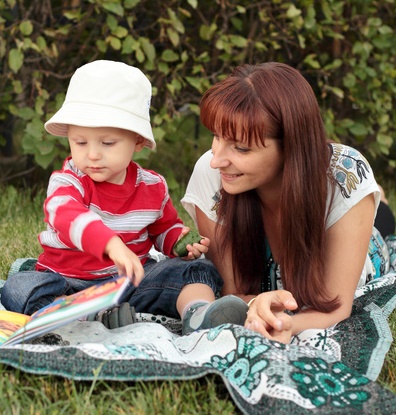 Mother and Child Reading Outdoors-Fotolia-c lanych-Cropped